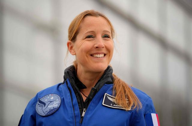(FILES) French ESA astronaut Sophie Adenot addresses a press conference and plants a tree at the European Space Agency (ESA) in Cologne, western Germany on January 5, 2026. Adenot, who is currently staying on the International Space Station (ISS), will perform her first spacewalk on Tuesday, August 18, 2026, accompanied by American Anil Menon, a first for a French woman. (Photo by Pau BARRENA / AFP)