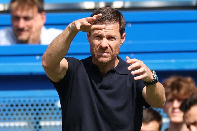 (FILES) Chelsea's Spanish Manager Xabi Alonso gestures on the touchline during the pre-season friendly football match between Chelsea and Real Sociedad at Stamford Bridge in London on August 15, 2026. Nine Premier League clubs will have new managers when the season kicks off on Friday, August 21 but few will feel the heat quite like Enzo Maresca, Andoni Iraola and Xabi Alonso. (Photo by Adrian Dennis / AFP)
