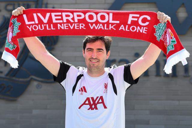 (FILES) Andoni Iraola, the new manager for English Premier League football side Liverpool, poses for a picture at the team's training ground in Kirkby, Liverpool, north-west England on July 13, 2026. Nine Premier League clubs will have new managers when the season kicks off on Friday, August 21, but few will feel the heat quite like Enzo Maresca, Andoni Iraola and Xabi Alonso. (Photo by PETER POWELL / AFP)