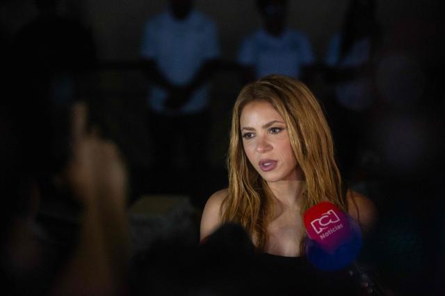 Colombian singer Shakira talks to the media after visiting destroyed areas after a 7.4 earthquake in Quibdo, Colombia on August 17, 2026. The noise of backhoes, cranes and bulldozers echoed across Colombia's quake-hit cities as workers labored to remove rubble, though the chance of finding survivors was slim a week after the disaster. (Photo by AFP)
