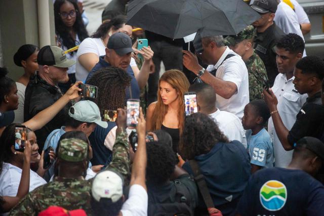 Colombian singer Shakira talks to the media after visiting destroyed areas after a 7.4 earthquake in Quibdo, Colombia on August 17, 2026. The noise of backhoes, cranes and bulldozers echoed across Colombia's quake-hit cities as workers labored to remove rubble, though the chance of finding survivors was slim a week after the disaster. (Photo by AFP)