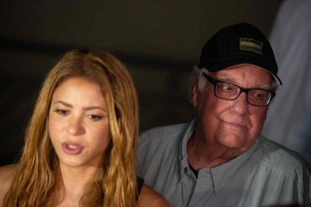 US businessman Howard Buffett is pictured as Colombian singer Shakira talks to the media after visiting destroyed areas after a 7.4 earthquake in Quibdo, Colombia on August 17, 2026. The noise of backhoes, cranes and bulldozers echoed across Colombia's quake-hit cities as workers labored to remove rubble, though the chance of finding survivors was slim a week after the disaster. (Photo by AFP)
