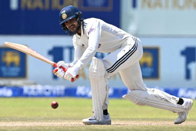 India's Shubman Gill plays a shot during the fourth day of the first Test cricket match between Sri Lanka and India at the Galle International Stadium in Galle on August 18, 2026. (Photo by Ishara S. KODIKARA / AFP)