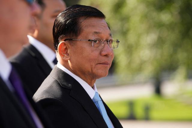 Myanmar's President Min Aung Hlaing looks on as he attends a wreath-laying ceremony at the Tomb of the Unknown Soldier near the Kremlin wall in Moscow on August 18, 2026. (Photo by Pavel Bednyakov / POOL / AFP)