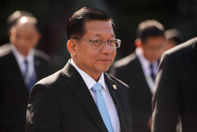 Myanmar's President Min Aung Hlaing looks on as he attends a wreath-laying ceremony at the Tomb of the Unknown Soldier near the Kremlin wall in Moscow on August 18, 2026. (Photo by Pavel Bednyakov / POOL / AFP)