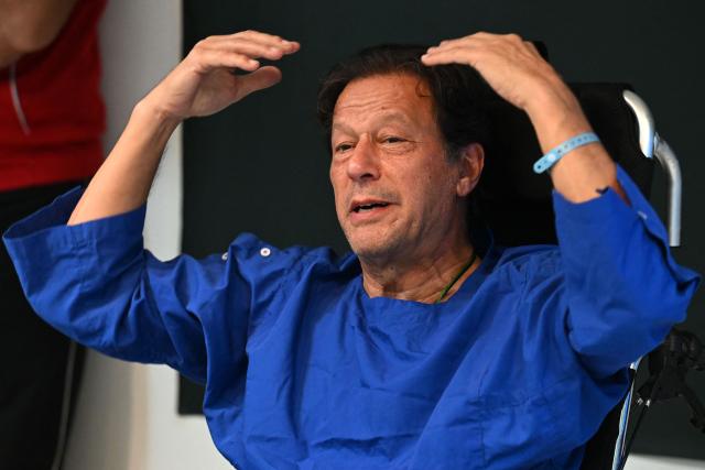 (FILES) In this picture taken on on November 4, 2022, Pakistan's former prime minister Imran Khan addresses the media representatives at a hospital in Lahore, a day after an assassination attempt on him. Pakistan's Supreme Court on August 18, 2026, has ordered jailed former prime minister Imran Khan to be moved to hospital for medical checks, after a petition by his lawyers over claims of poor health. (Photo by Arif ALI / AFP)