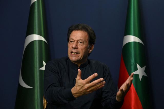 (FILES) Former Pakistan's prime minister Imran Khan gestures as he speaks during an interview with AFP at his residence in Lahore on May 18, 2023. Pakistan's Supreme Court on August 18, 2026, has ordered jailed former prime minister Imran Khan to be moved to hospital for medical checks, after a petition by his lawyers over claims of poor health. (Photo by Arif ALI / AFP)