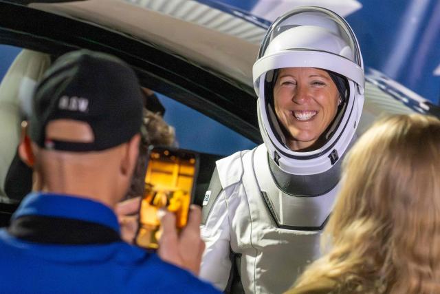 (FILES) ESA (European Space Agency) astronaut Sophie Adenot reacts as she prepares to travel to the SpaceX Falcon 9 rocket with the company's Dragon spacecraft at Space Launch Complex 40 for the Crew-12 mission at Cape Canaveral Space Force Station in Florida, on February 13, 2026. Sophie Adenot became the first French female astronaut to venture outside the International Space Station for a spacewalk on August 18, 2026, accompanied by American astronaut Anil Menon. President Emmanuel Macron hailed Sophie Adenot's spacewalk, describing the event as a source of "French pride" and seeing the astronaut as "the face of all possibilities." (Photo by Jim WATSON / AFP)