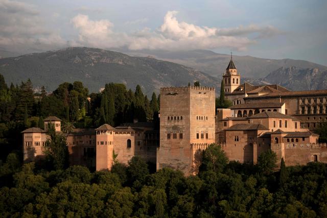 (FILES) Picture shows a general view of the Alhambra in Granada on June 10, 2023. A magnitude-4.8 earthquake caused cracks in walls and sent debris falling in Granada on August 18, 2026 lightly injuring three people, officials said, days after a slightly stronger quake hit the southern Spanish city. Conservation teams and experts were checking Granada's Alhambra palace, a UNESCO-listed jewel of medieval Islamic architecture and the seat of Spain's last Muslim kingdom. (Photo by JORGE GUERRERO / AFP)