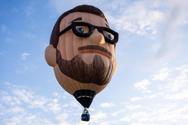 Sweden Democrats party leader Jimmie Akesson takes off in a giant air balloon depicting his image during his election campaign in Norsborg, near Stockholm, on August 18, 2026, ahead of Sweden’s general election in September. (Photo by Jonathan NACKSTRAND / AFP)