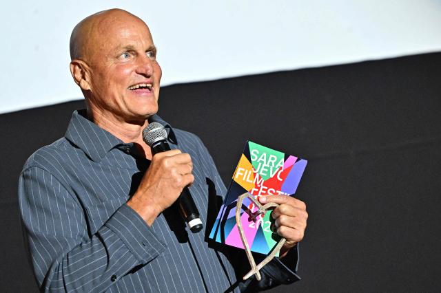 US actor Woody Harrelson speaks on stage with his "Heart Of Sarajevo" award at the 32nd Sarajevo Film Festival in Sarajevo, Bosnia and Herzegovina, on August 18, 2026. (Photo by ELVIS BARUKCIC / AFP)