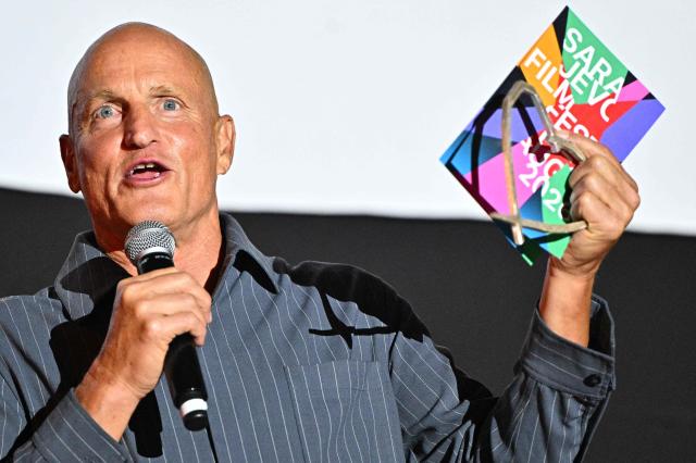 US actor Woody Harrelson speaks on stage with his "Heart Of Sarajevo" award at the 32nd Sarajevo Film Festival in Sarajevo, Bosnia and Herzegovina, on August 18, 2026. (Photo by ELVIS BARUKCIC / AFP)