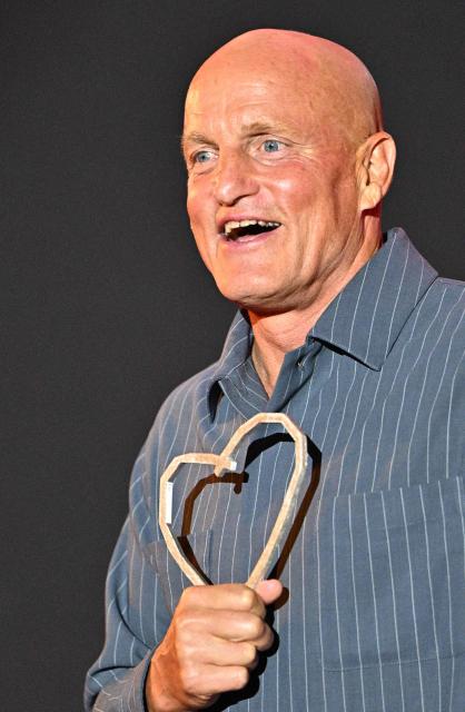 US actor Woody Harrelson speaks on stage with his "Heart Of Sarajevo" award at the 32nd Sarajevo Film Festival in Sarajevo, Bosnia and Herzegovina, on August 18, 2026. (Photo by ELVIS BARUKCIC / AFP)