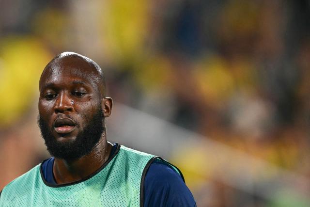 Fenerbahce's Belgian forward #09 Romelu Lukaku looks on as he warms up during the UEFA Champions League qualifying playoff - first leg football match between Fenerbahce SK and Olympique Lyonnais (OL) at the Sukru Saracoglu Stadium in Istanbul on August 18, 2026. (Photo by YASIN AKGUL / AFP)