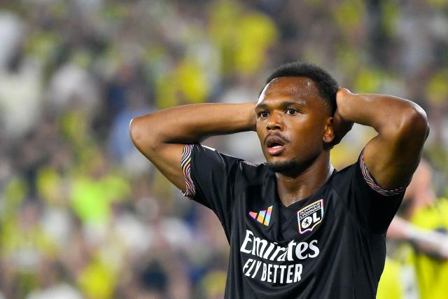 Lyon's Belgian forward #17 Lois Openda reacts during the UEFA Champions League qualifying playoff - first leg football match between Fenerbahce SK and Olympique Lyonnais (OL) at the Sukru Saracoglu Stadium in Istanbul on August 18, 2026. (Photo by YASIN AKGUL / AFP)