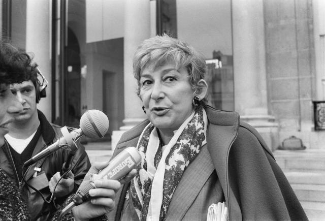 (FILES) Yvette Roudy, minister delegate to French Prime minister, minister for women's rights, answers journalists' questions at the end of the council of ministers, in the courtyard of the French presidential Elysee Palace in Paris, on November 7, 1984. Yvette Roudy, who served as the first Minister of Women's Rights between 1981 and 1986, died on August 18, 2026 in Cabestany (Pyrénées-Orientales) at the age of 97, her nephew Jean-Pierre Saldou told AFP. (Photo by PIERRE GUILLAUD / AFP)