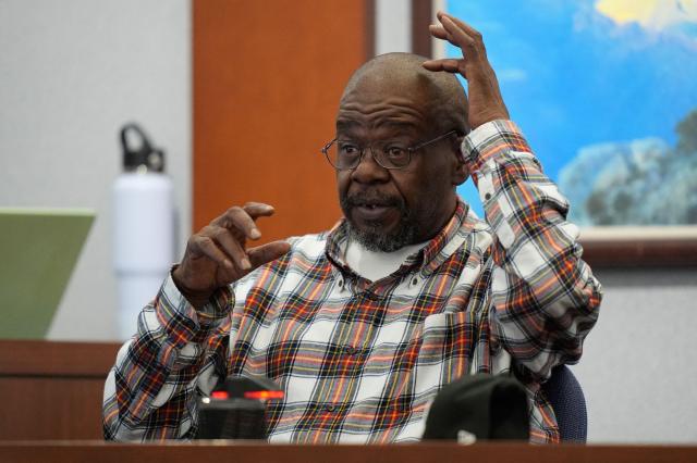 James McDonald, former Death Row Records security/bodyguard and longtime associate of Suge Knight, testifies during the murder trial of Duane Davis related to the 1996 killing of rapper Tupac Shakur, at Clark County District Court Regional Justice Center in Las Vegas, Nevada, on August 18, 2026. The trial of the former gang leader accused of orchestrating the murder of rapper Tupac Shakur began on August 10, 30 years after one of America's most high-profile unresolved killings. The proceedings, expected to last a month, will likely not make clear who fired the shots that killed the California hip-hop legend on the night of September 7, 1996, while he was in Las Vegas to see a Mike Tyson boxing match. (Photo by John Locher / POOL / AFP)