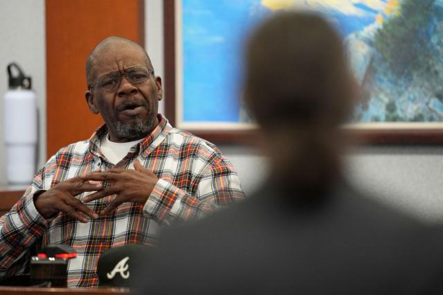 James McDonald, former Death Row Records security/bodyguard and longtime associate of Suge Knight, testifies during the murder trial of Duane Davis related to the 1996 killing of rapper Tupac Shakur, at Clark County District Court Regional Justice Center in Las Vegas, Nevada, on August 18, 2026. The trial of the former gang leader accused of orchestrating the murder of rapper Tupac Shakur began on August 10, 30 years after one of America's most high-profile unresolved killings. The proceedings, expected to last a month, will likely not make clear who fired the shots that killed the California hip-hop legend on the night of September 7, 1996, while he was in Las Vegas to see a Mike Tyson boxing match. (Photo by John Locher / POOL / AFP)