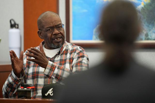 James McDonald, former Death Row Records security/bodyguard and longtime associate of Suge Knight, testifies during the murder trial of Duane Davis related to the 1996 killing of rapper Tupac Shakur, at Clark County District Court Regional Justice Center in Las Vegas, Nevada, on August 18, 2026. The trial of the former gang leader accused of orchestrating the murder of rapper Tupac Shakur began on August 10, 30 years after one of America's most high-profile unresolved killings. The proceedings, expected to last a month, will likely not make clear who fired the shots that killed the California hip-hop legend on the night of September 7, 1996, while he was in Las Vegas to see a Mike Tyson boxing match. (Photo by John Locher / POOL / AFP)