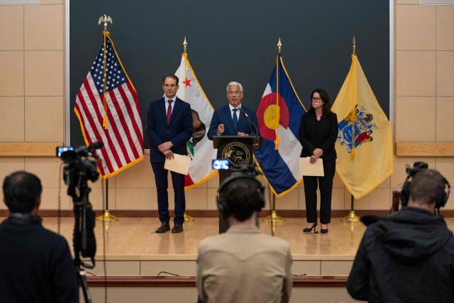 California Attorney General Rob Bonta (C) speaks alongside Colorado Attorney General Phil Weiser (L) and New Jersey Attorney General Jennifer Davenport during a press conference after opening arguments took place in the Meta trial over a lawsuit brought by US states about social media addiction at the Ronald V. Dellums Federal Building and United States Courthouse in Oakland, California, on August 18, 2026. A coalition of US states is seeking around $200 billion in damages against Meta, which they accuse of intentionally designing Facebook and Instagram to be addictive for children. Meta previously had claimed in court documents that the financial penalties could reach $1.4 trillion, close to its entire market value which hovers around $1.5 trillion. (Photo by Godofredo A. VÁSQUEZ / AFP)