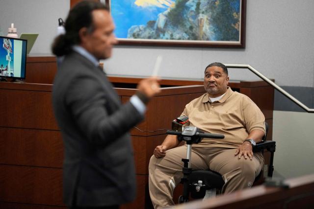 Reggie Wright Jr., security chief for Death Row Records, testifies during the murder trial of Duane Davis related to the 1996 killing of rapper Tupac Shakur, at Clark County District Court Regional Justice Center in Las Vegas, Nevada, on August 18, 2026. The trial of the former gang leader accused of orchestrating the murder of rapper Tupac Shakur began on August 10, 30 years after one of America's most high-profile unresolved killings. The proceedings, expected to last a month, will likely not make clear who fired the shots that killed the California hip-hop legend on the night of September 7, 1996, while he was in Las Vegas to see a Mike Tyson boxing match. (Photo by John Locher / POOL / AFP)