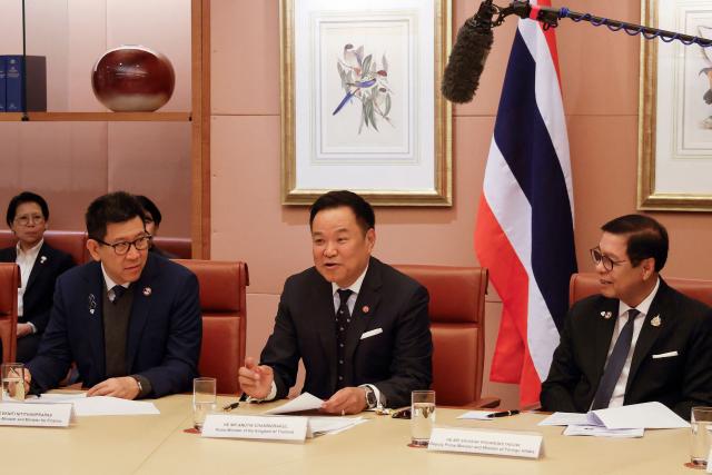 Thailand Prime Minister Anutin Charnvirakul (C) and his delegation meet with Australian Prime Minister Anthony Albanese and members of government at Parliament House in Canberra on August 19, 2026. Thailand's prime minister is on a three-day official visit to Australia. (Photo by Hilary Wardhaugh / POOL / AFP)