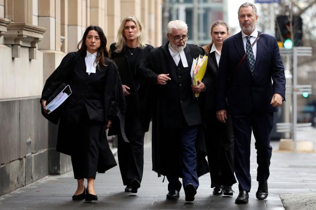 Members of Erin Patterson's legal team, (front row L-R) barrister Veronika Drago, barrister Richard Edney and lawyer Bill Doogue arrive at the Supreme Court of Victoria in Melbourne on August 19, 2026. Australian toxic mushroom killer Erin Patterson's bid to overturn her conviction in a triple-murder case kicked off on August 19, 2026 at a court in Melbourne, according to an official livestream of the proceedings. (Photo by Martin KEEP / AFP)
