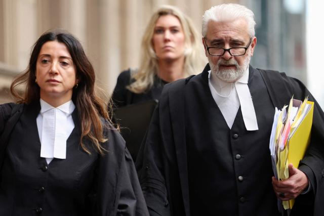 Members of Erin Patterson's legal team, barrister Veronika Drago (L) and barrister Richard Edney (R), arrive at the Supreme Court of Victoria in Melbourne on August 19, 2026. Australian toxic mushroom killer Erin Patterson's bid to overturn her conviction in a triple-murder case kicked off on August 19, 2026 at a court in Melbourne, according to an official livestream of the proceedings. (Photo by Martin KEEP / AFP)