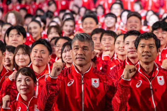 Kosei Inoue (C), Team Japan Captain, poses during a team Japan photo after a send off ceremony at the Grand Prince Hotel Shin Takanawa in Tokyo on August 19, 2026. (Photo by ANDREW CABALLERO-REYNOLDS / AFP)