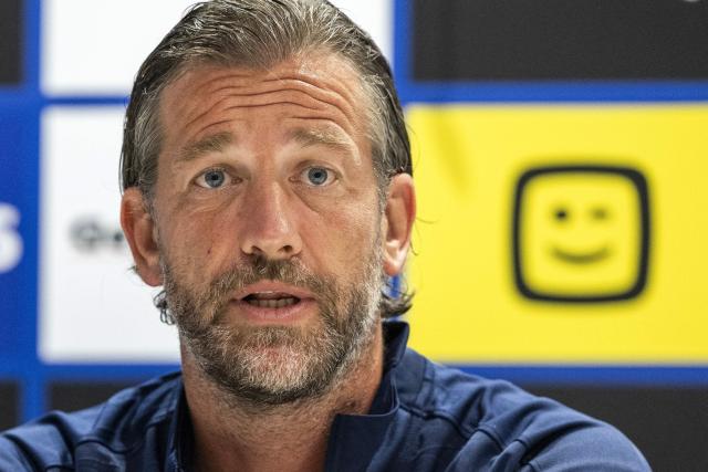 KAA Gent's Belgian head coach Rik De Mil reacts as he delivers a press conference in Ghent on August 19, 2026, on the eve of KAA Gent's UEFA Conference League play-off round first-leg match against Scottish club Hibernian FC. (Photo by NICOLAS MAETERLINCK / Belga / AFP) / Belgium OUT