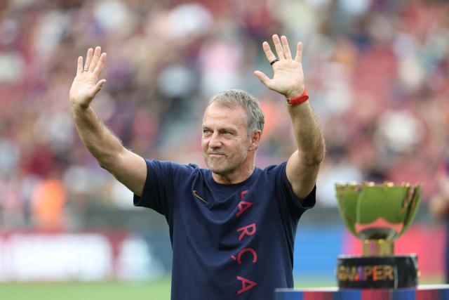 Barcelona's German coach Hans-Dieter Flick gestures during the presentation of the 61st Joan Gamper Trophy football match between FC Barcelona and Al Ahly FC at the Camp Nou Stadium in Barcelona on August 19, 2026. (Photo by Lluis GENE / AFP)