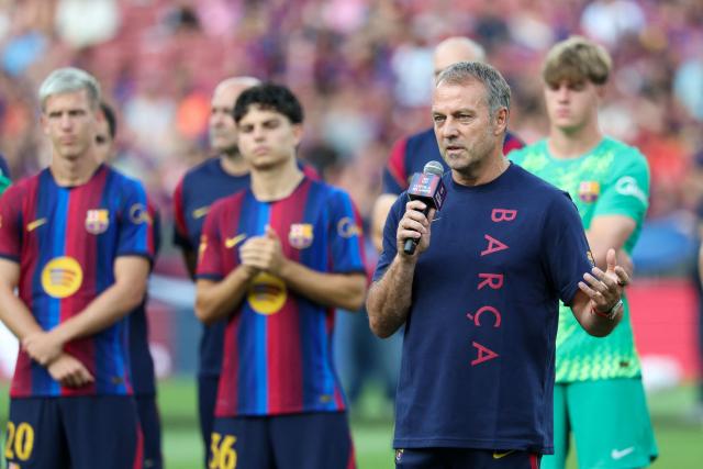Barcelona's German coach Hans-Dieter Flick speaks during the presentation of the 61st Joan Gamper Trophy football match between FC Barcelona and Al Ahly FC at the Camp Nou Stadium in Barcelona on August 19, 2026. (Photo by Lluis GENE / AFP)