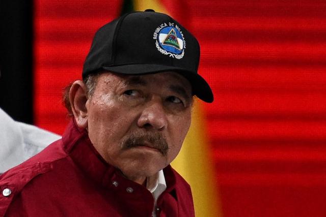 (FILES) Nicaragua's President Daniel Ortega looks on during the opening session of the XXIV ALBA-TCP Summit in Caracas on December 14, 2024. The Organization of American States (OAS) on August 19, 2026 approved a resolution promoted by the US to convene an “urgent” meeting of foreign ministers to discuss actions in response to the Nicaraguan government’s plan to eliminate competitive elections, just days before Nicaragua’s Congress, controlled by co-presidents Daniel Ortega and Rosario Murillo, is expected to approve a constitutional reform that excludes the opposition from elections and establishes a “renewable” seven-year presidential term. (Photo by Juan BARRETO / AFP)