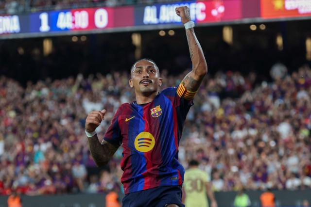 Barcelona's Brazilian forward #11 Raphinha celebrates after scoring their second goal from the penalty spot during the 61st Joan Gamper Trophy football match between FC Barcelona and Al Ahly FC at the Camp Nou Stadium in Barcelona on August 19, 2026. (Photo by Lluis GENE / AFP)
