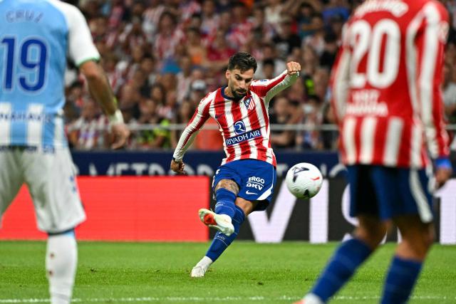 Atletico Madrid's Spanish forward #10 Alex Baena scores their second goal during the Spanish league football match between Club Atletico de Madrid and Malaga CF at the Metropolitano Stadium in Madrid on August 19, 2026. (Photo by Javier SORIANO / AFP)