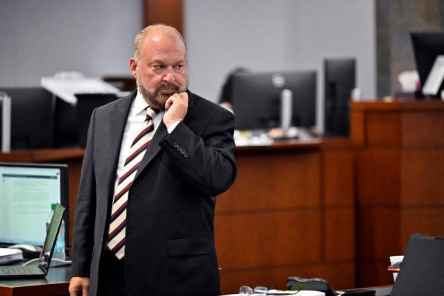 Clark County Chief Deputy District Attorney Marc DiGiacomo looks on during the Duane Davis murder trial, related to the 1996 killing of rapper Tupac Shakur, at Clark County District Court at the Regional Justice Center in Las Vegas, Nevada, on August 19, 2026. The trial of the former gang leader accused of orchestrating the murder of rapper Tupac Shakur began on August 10, 30 years after one of America's most high-profile unresolved killings. The proceedings, expected to last a month, will likely not make clear who fired the shots that killed the California hip-hop legend on the night of September 7, 1996, while he was in Las Vegas to see a Mike Tyson boxing match. (Photo by David Becker / POOL / AFP)