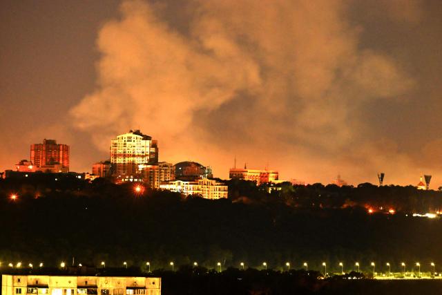 Smoke rises from missiles launched by Russia, in Kyiv, Ukraine, on August 20, 2026. (Photo by Eugene KOTENKO / AFP)