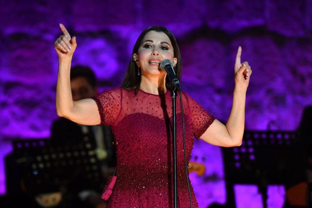 Lebanese singer Majida El Roumi performs during the closing ceremony of the 60th session of the International Festival of Carthage (FIC) at the Carthage Roman Theatre on the outskirts of Tunis on August 19, 2026. (Photo by FETHI BELAID / AFP)
