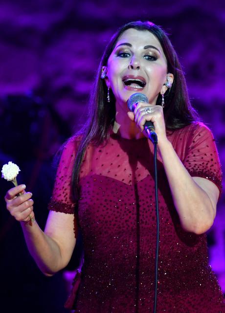 Lebanese singer Majida El Roumi performs during the closing ceremony of the 60th session of the International Festival of Carthage (FIC) at the Carthage Roman Theatre on the outskirts of Tunis on August 19, 2026. (Photo by FETHI BELAID / AFP)