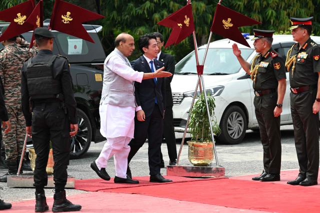 India's Defence Minister Rajnath Singh and Japan’s Defence Minister Shinjiro Koizumi arrive for their bilateral meeting at the Manekshaw Centre in New Delhi on August 20, 2026. (Photo by Sajjad HUSSAIN / AFP)