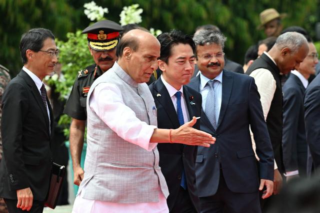 India's Defence Minister Rajnath Singh and Japan’s Defence Minister Shinjiro Koizumi arrive for their bilateral meeting at the Manekshaw Centre in New Delhi on August 20, 2026. (Photo by Sajjad HUSSAIN / AFP)