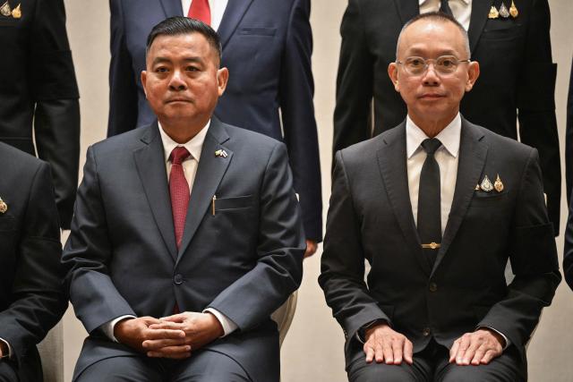 Myanmar’s military commander-in-chief, General Ye Win Oo (L) and Thailand’s Chief of Defence Forces, Ukrit Boontanon (R) pose for photos after their High-Level Committee Meeting talks at the Chatrium Grand hotel in Bangkok on August 20, 2026. (Photo by ANTHONY WALLACE / AFP)