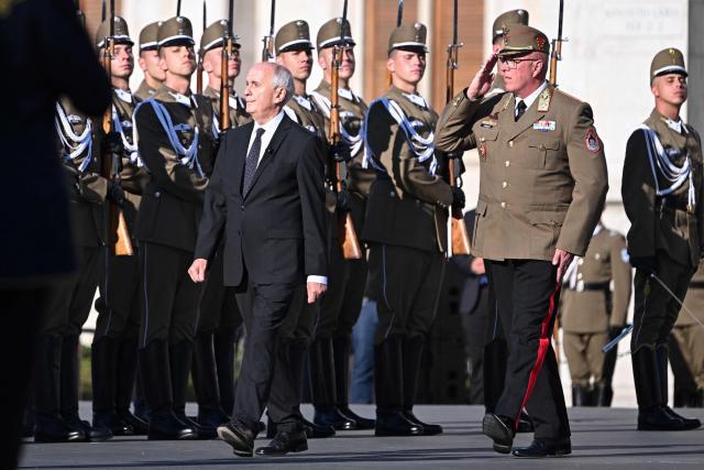 Hungarian President Andras Baka (L) inspects the honour guard during a ceremony marking the country's national day attended by guests and ambassadors accredited to Hungary on August 20, 2026, in Budapest. Hungary marks the 1,026th anniversary of the foundation of the Hungarian state, established by the first king of Hungary, Stephen I.  Hungarian President Andras Baka, who took office yesterday, makes his first public appearance since then. (Photo by Attila KISBENEDEK / AFP)