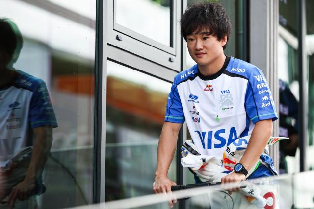 Racing Bulls' Japanese reserve driver Yuki Tsunoda drives a scooter in the paddock ahead of the Formula One Dutch Grand Prix at The Circuit Zandvoort, western Netherlands, on August 20, 2026. (Photo by SIMON WOHLFAHRT / AFP)
