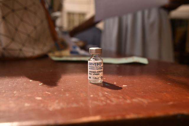 (FILES) This photograph shows a vial of Ebola vaccine Ervebo in Freetown on December 5, 2024. The World Health Organization said on August 20, 2026 that Ebola-hit Democratic Republic of Congo would receive 70,000 doses of a vaccine approved for protecting against the virus, but not the strain spreading in the country. (Photo by Saidu BAH / AFP)