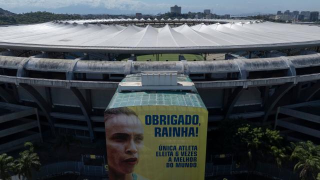 (FILES) Aerial view of the Maracana stadium in Rio de Janeiro, Brazil on May 7, 2025. The Maracana will further cement its place in history as a footballing mecca: the Rio de Janeiro stadium will host the opening match and the final of the 2027 Women’s World Cup, the first to be held in South America, FIFA announced on August 20, 2026. (Photo by Pablo PORCIUNCULA / AFP)