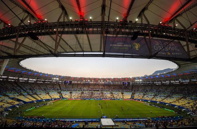 (FILES) General view of the Maracana stadium taken during the Copa America football tournament group match between Paraguay and Qatar, in Rio de Janeiro, Brazil, on June 16, 2019. The Maracana will further cement its place in history as a footballing mecca: the Rio de Janeiro stadium will host the opening match and the final of the 2027 Women’s World Cup, the first to be held in South America, FIFA announced on August 20, 2026. (Photo by Mauro PIMENTEL / AFP)