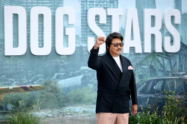 British actor Benedict Wong poses upon arrival on the red carpet for the world premiere of the film 'The Dog Stars', in central London on August 20, 2026. (Photo by Henry NICHOLLS / AFP)