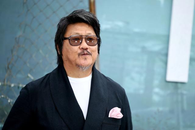 British actor Benedict Wong poses upon arrival on the red carpet for the world premiere of the film 'The Dog Stars', in central London on August 20, 2026. (Photo by Henry NICHOLLS / AFP)