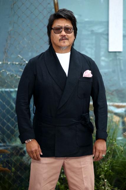 British actor Benedict Wong poses upon arrival on the red carpet for the world premiere of the film 'The Dog Stars', in central London on August 20, 2026. (Photo by Henry NICHOLLS / AFP)